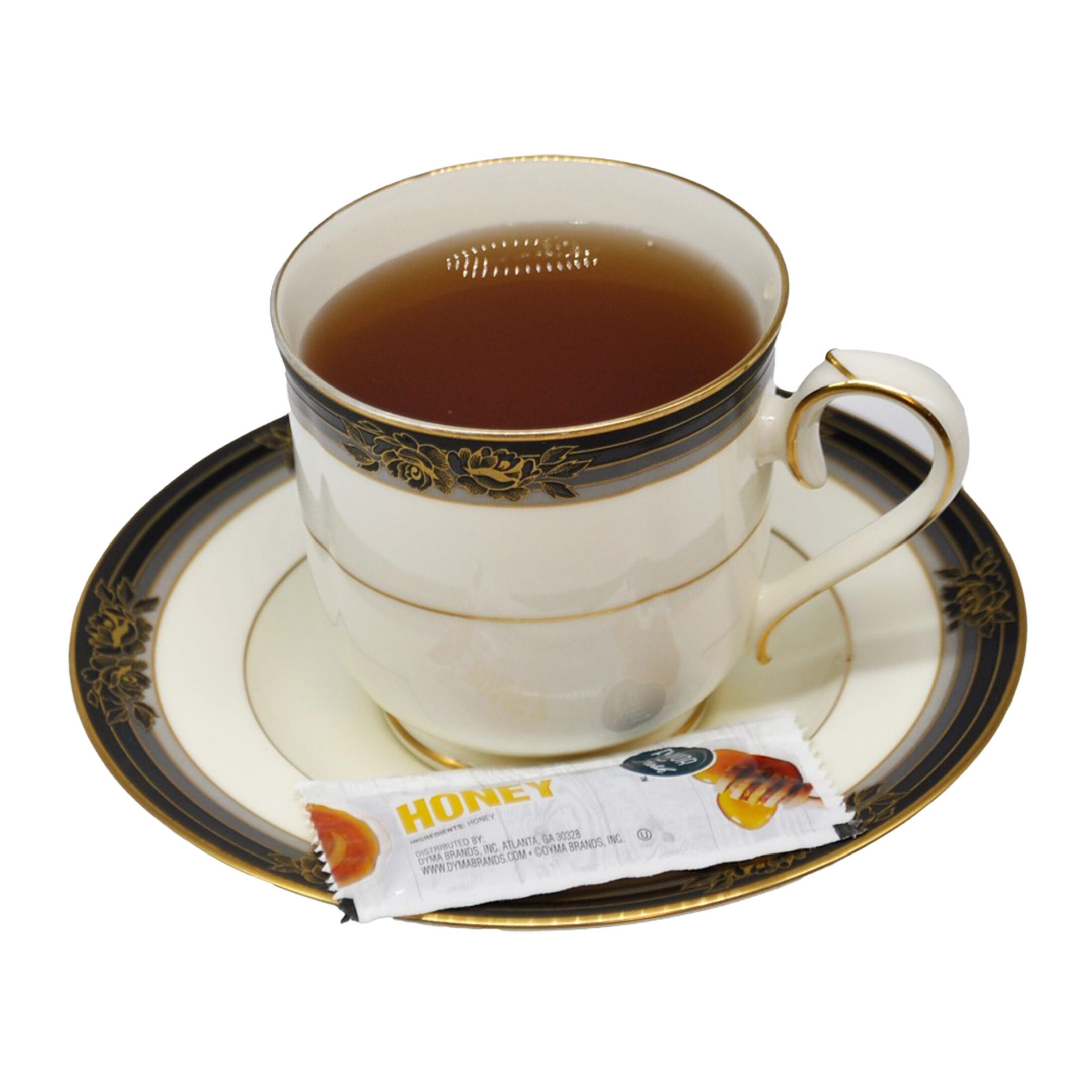 Teacup and saucer with tea and honey